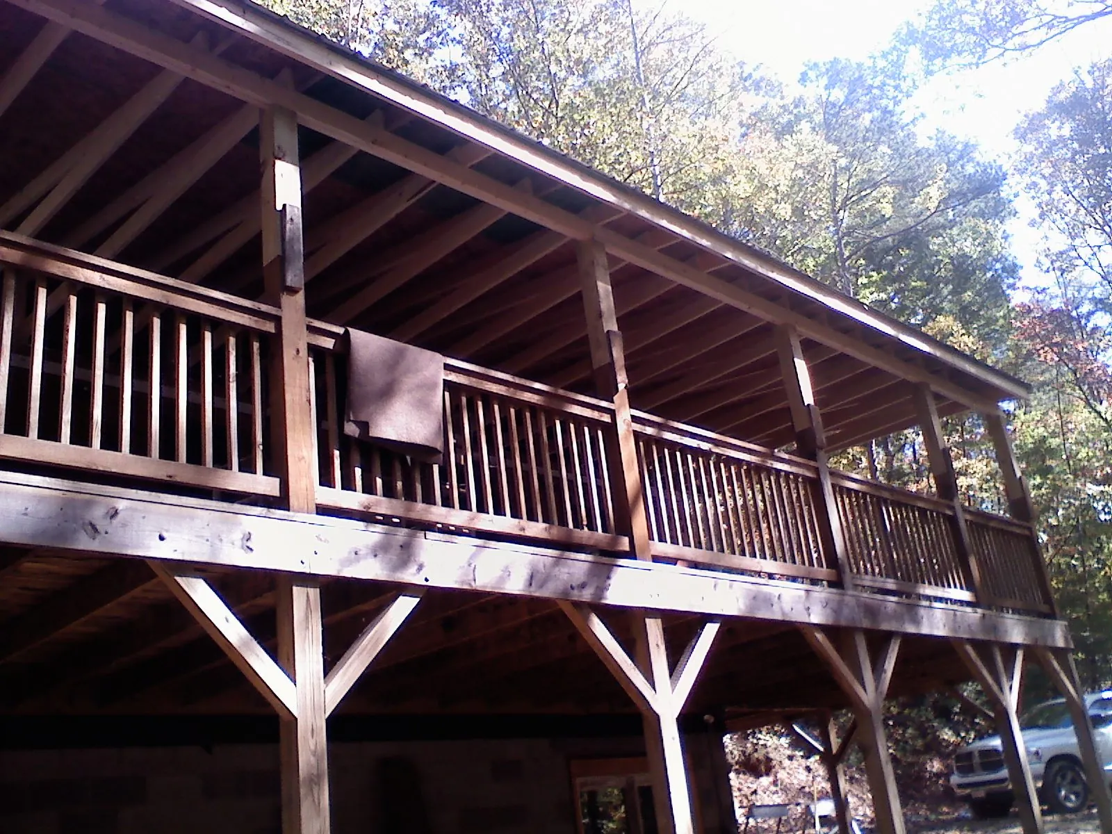 Timber framing under a new elevated porch and deck — Roof Leak Repair in Wilmot by Roofing Brothers